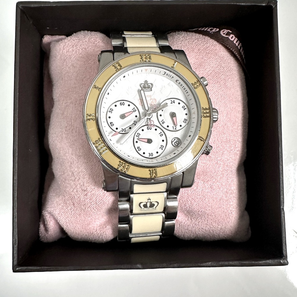 Juicy Couture stainless steel with ivory enamel watch. Made by Movado group.